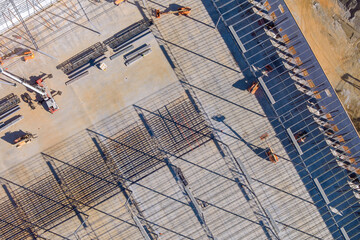 Structure building of steel roof trusses during construction of metal warehouses