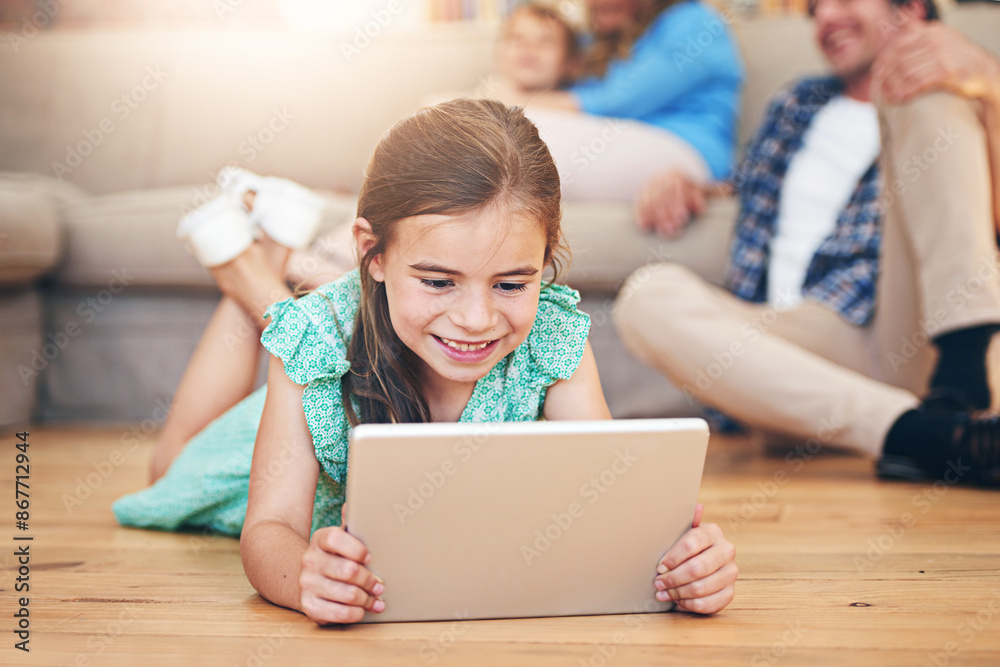 Poster Girl, happy and playing with tablet on floor for digital education, ebook and development as child. German kid, smile and tech on ground for cartoon, video and movie or virtual gaming app in house