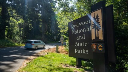 Crescent City, Califfornia - 5-9-2024:Redwood National and State Park entrance sign with motion...