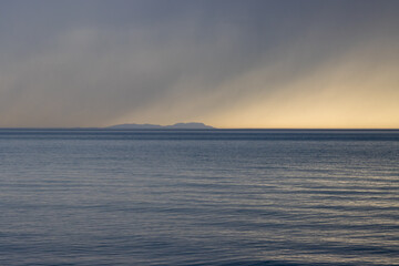 Obraz premium Calm sea and island Ereikousa, Greece
