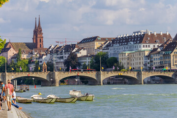 Obraz premium Basel city- A bridge spans Rhein river with a city in the background