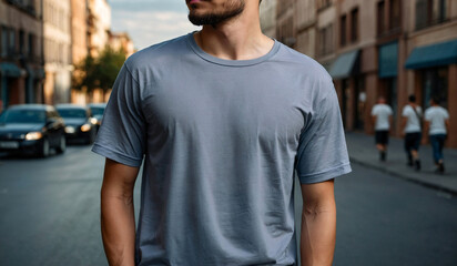 Muscular man wearing a trendy T-shirt while standing by a bustling city street, Print T-shirt Mockup