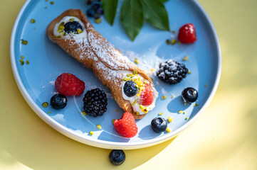 Deliciously filled Italian cannoli siciliani
