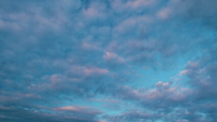 Cirrocumulus cloud in evening. Beautiful and relaxing clouds with a dark blue afternoon sky.