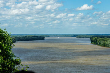 barge travels the mississippi river between Missouri and Illinois