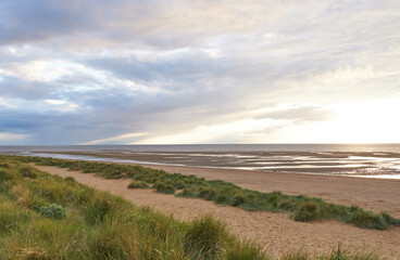 Deserted beach at low tide