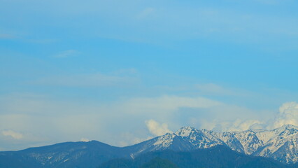 Mountain In Snow At The Day. Dynamic Movement Across Snow-Covered Slopes.