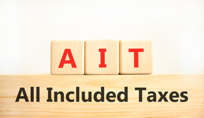 AIT All included taxes symbol. Concept words AIT All included taxes on beautiful wooden blocks. Beautiful white background. Business AIT all included taxes concept. Copy space.