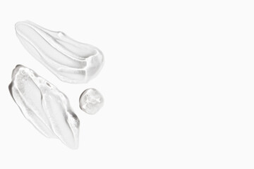Smears of cosmetic gel texture on a light background