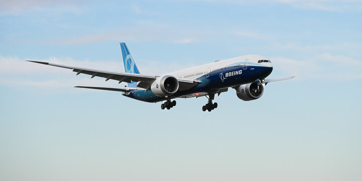 Everett, WA, USA - February 16, 2024; Boeing livery 777-9 prototype of 777X  aircraft wheels down landing as N779XX