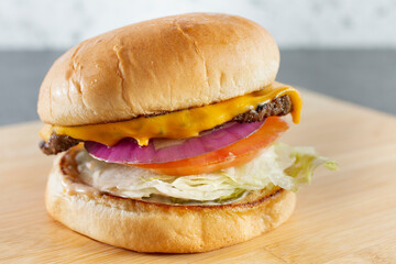 A view of a cheeseburger.