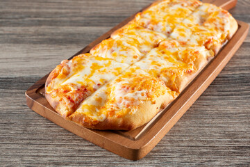A view of a cheese flatbread.