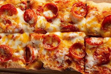 A top down view of a pepperoni flatbread.