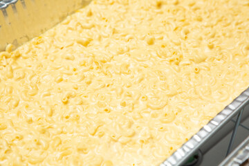 A view of a catering tray of mac n cheese.