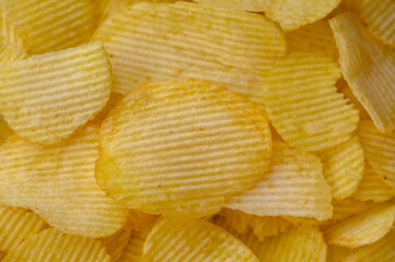 Potato chips snack as background image texture background. Copy, empty space for text