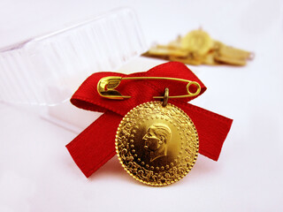 Traditional Turkish gold coin on a white isolated background. Known in Turkish as "Çeyrek Altın" (Quarter Gold).