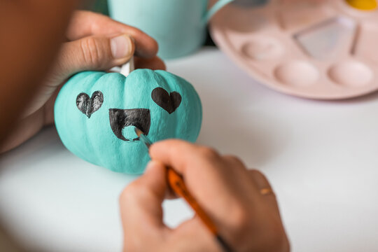 Pastel color pumpkins with copy space. Thanksgiving and Halloween background.