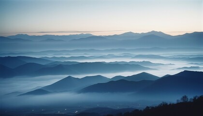 mountain layers and sunrise view in cold and foggy weather. 