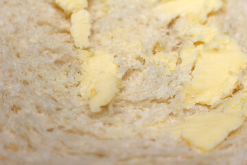 details than bread and butter. bread and butter texture. closeup on meal. food with selective focus.