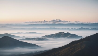 Obraz premium mountain layers and sunrise view in cold and foggy weather. 