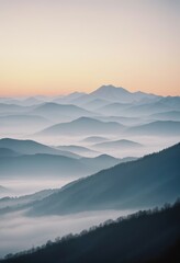 Fototapeta premium mountain layers and sunrise view in cold and foggy weather. 