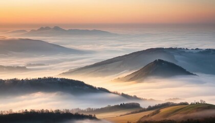 Fototapeta premium mountain layers and sunrise view in cold and foggy weather. 