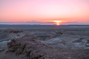 Sunrise over the rock formation of the White Stupa, also known as Tsagaan Suvarga,