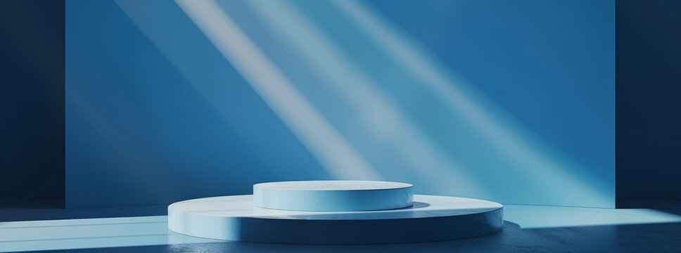 The blue studio background features a circular podium for product display, giving an elegant, modern, minimalist look