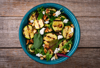 Healthy vegetarian food . Grilled green zucchini salad . . Food background