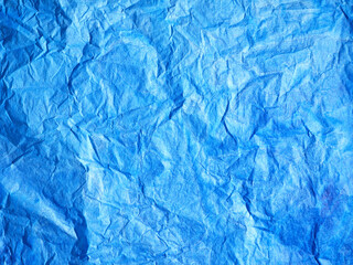 Abstract blue color background. Painted paper texture. Denim colour.