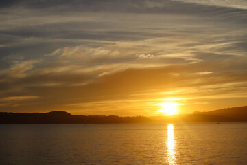 Sunset with dramatic sky over the sea.