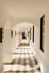 architecture of a historic mansion on a farm. White walls, blue doors and windows that demonstrate its beauty.