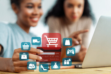 Customer hold credit card with hologram graphic interface of program. Client point laptop...