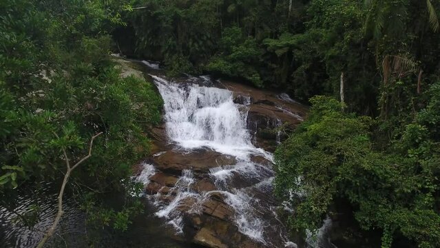 Aerial view of Pedra Branca Waterfall and Atlantic Forest on Serra do Mar - Paraty, Rio de Janeiro, Brazil