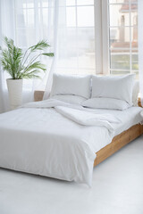 Fototapeta premium A room with a bed. Bedroom.