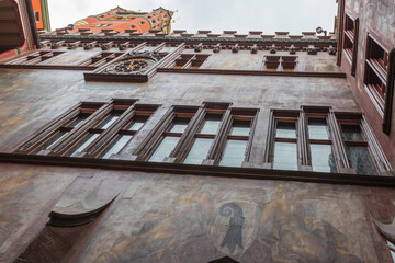 Basel old rathouse- red building with a blue sky in the background