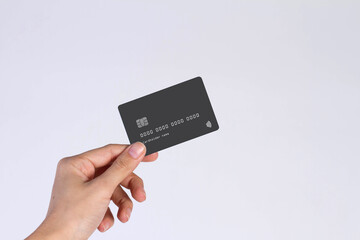 Hand showing credit card, or card, or business card or voucher, isolated on white background, template, mock-up