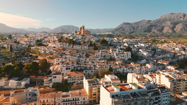 Aerial view of Altea town and Nostra Senyora del Consol church at sunset, Spain