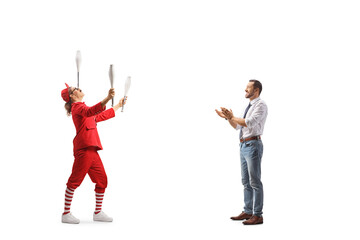 Fototapeta premium Man watching a juggler and clapping