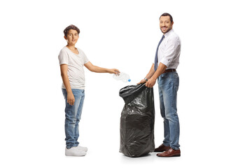 Man holding a waste bag and teenager throwing a plastic bottle