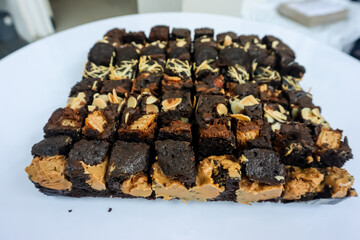 Chocolate brownies cake with various topping
