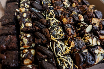 Chocolate brownies cake with various topping