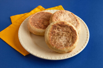 Bolo de caco. Traditional portuguese bread on blue a background