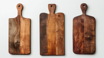 Fototapeta premium Three wooden cutting boards on white background with empty space