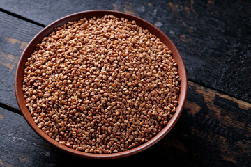 Buckwheat Grains on Plate, Healthy Cereal Concept, Close Up