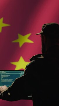 Vertical video Chinese engineer making troll accounts on social media promoting communist ideology. Software developer building algorithms to spread CCP government socialist doctrine, camera B