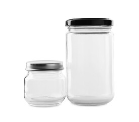 Two empty glass jars isolated on white