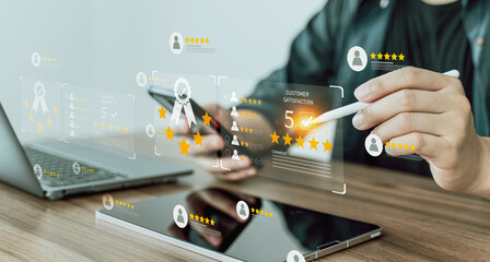 Customer review good rating concept, hand pressing user and five star icon on visual screen for...