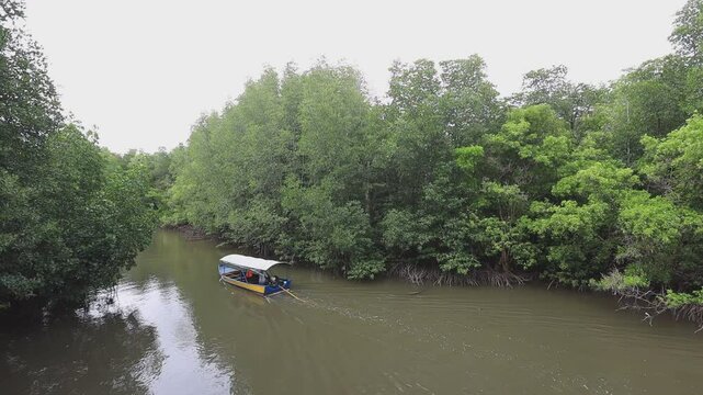 High angle video background with mountain scenery The river and the beautiful sunshine blurred onto the water surface in a golden light, the beauty of nature during the trip.