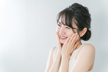 Fototapeta premium 美容・エステ・スキンケア・コスメ・アンチエイジングのイメジのアジア人女性 